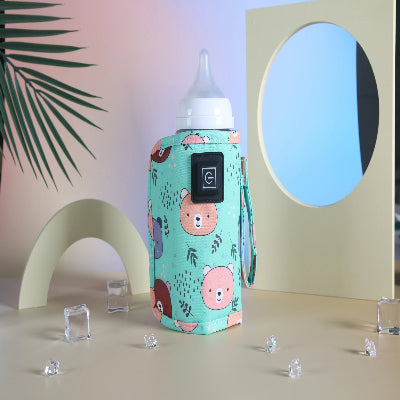 chauffe lait portable vert motif ours