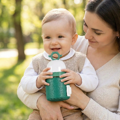 chauffe biberon portable vert pour sorties bebe