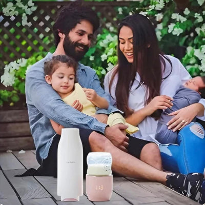 chauffe biberon sans fil bebe dans les bras de maman